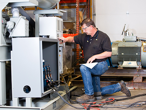 Universal Blower Pac Technician Working